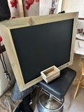 Chalkboard with wooden frame and eraser holder 